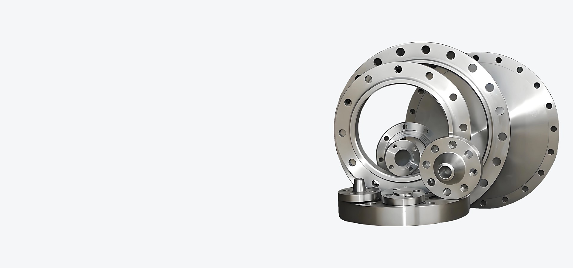 Forged flanges in nickel alloy and stainless steel stacked after machining at Shanghai Hangbo Alloy Group