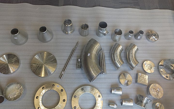 Titanium rings arranged on a workbench